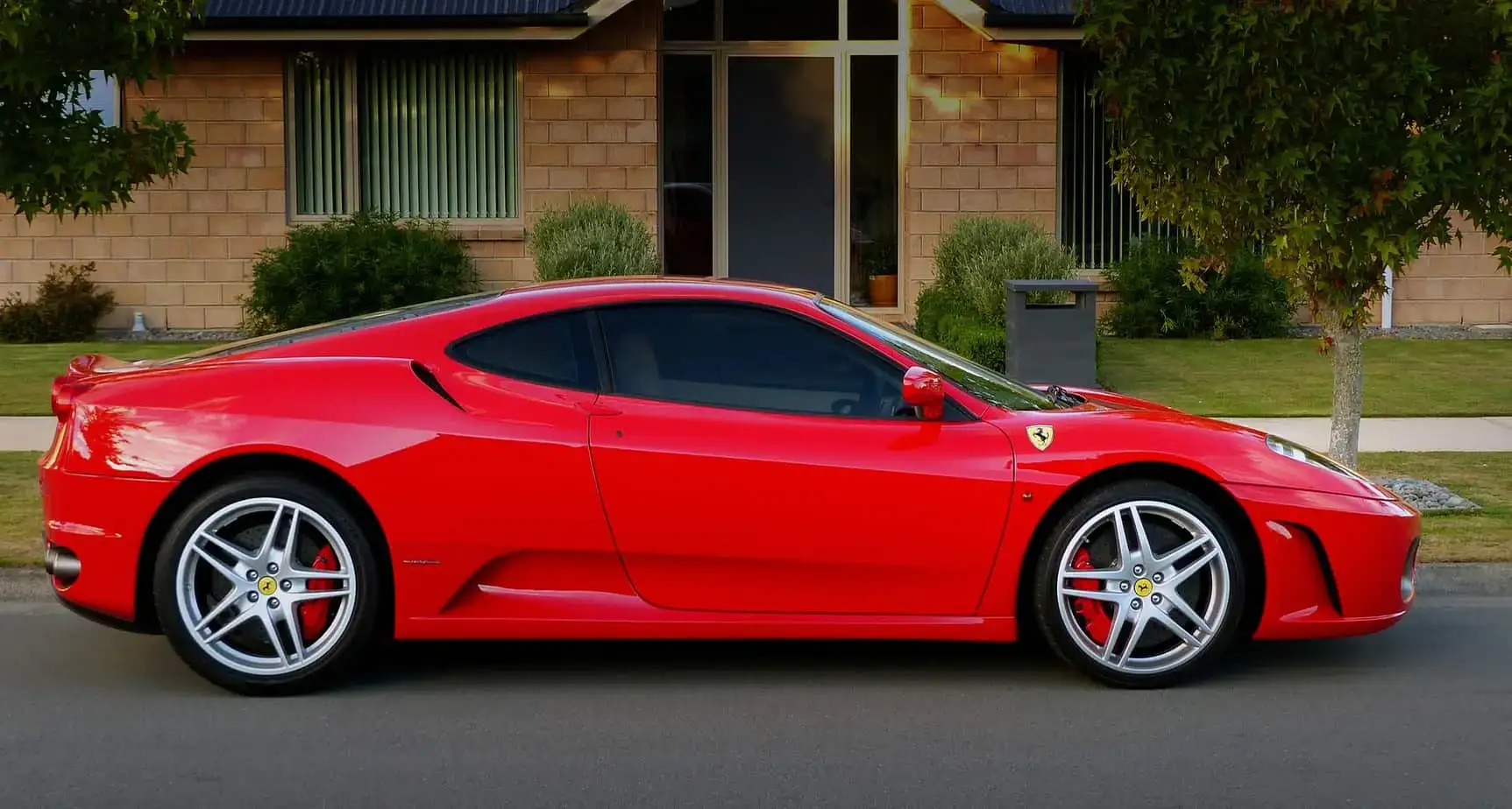 Burlington exotic car on flatbed soft-strap transport