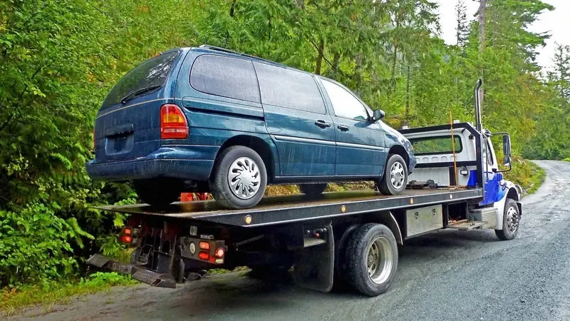 Burlington flatbed towing a cargo van