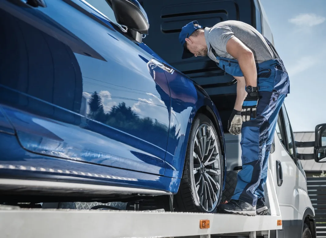 Burlington local tow truck loading vehicle