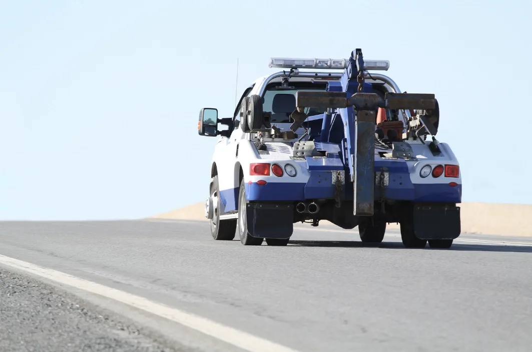 Burlington wrecker tow truck on the roadside